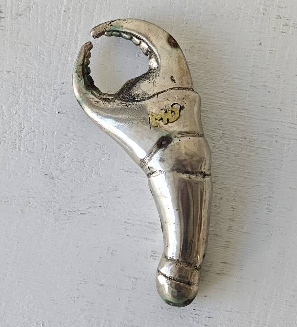 - a , metal Sculpture by Martyn Dempsey, measuring 15 x 6 cm (H x W) £55