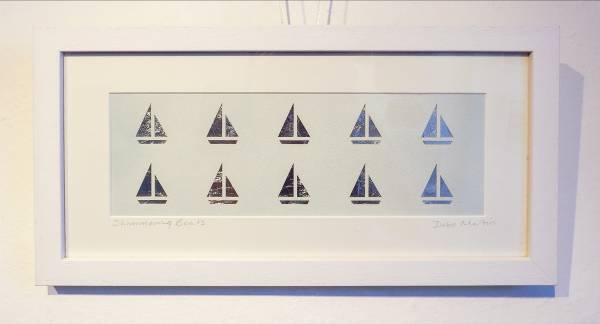 - a , Paper Sculpture by Debs Martin, measuring 10 x 28 cm (H x W) framed at 20 x 39 cm £55